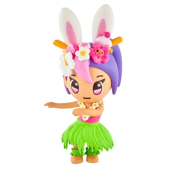 A tokidoki Hawaiian Ohana Blind Box Unicorno figurine featuring bunny ears, purple and pink hair, floral accents, a green grass skirt, and pink bracelets in a dancing pose.