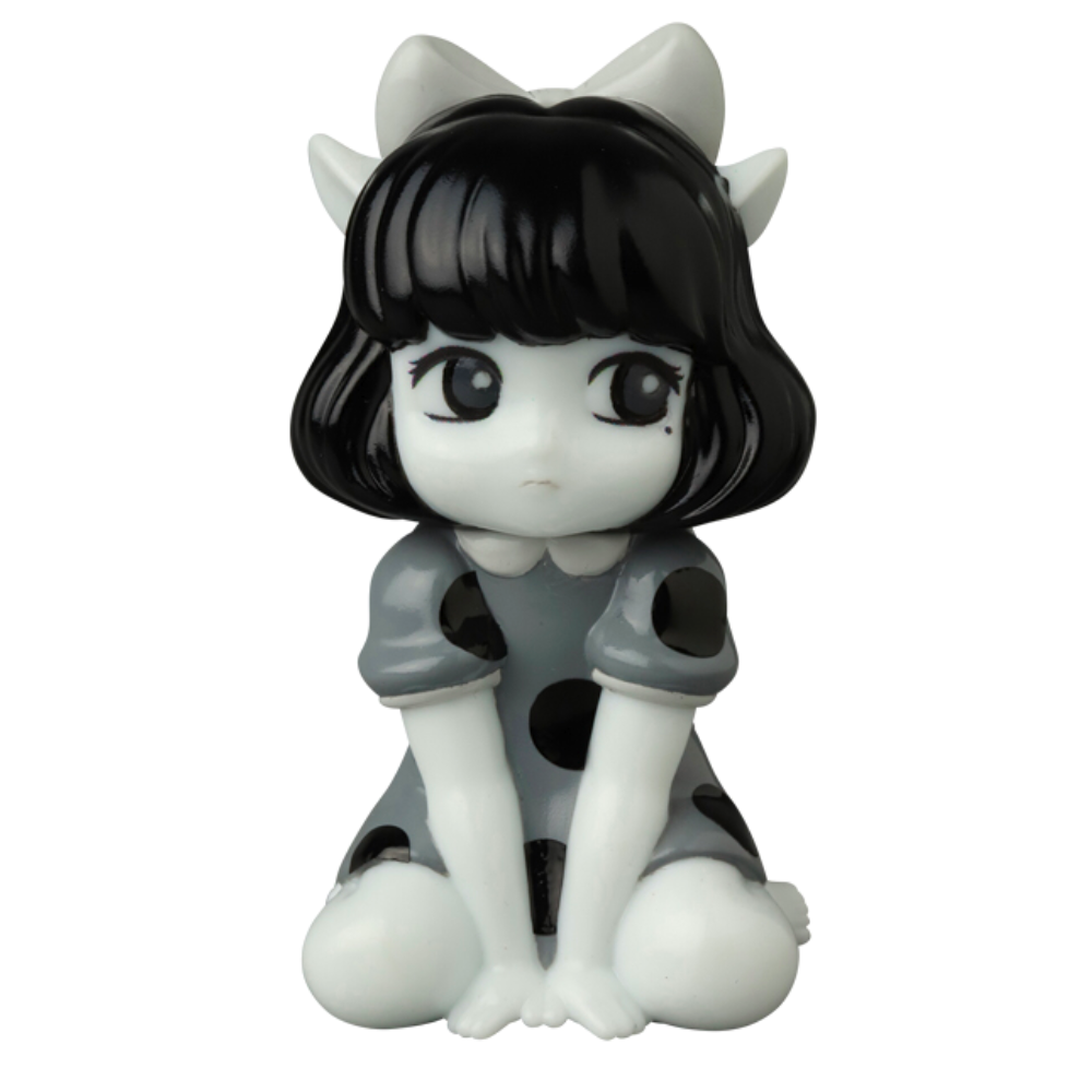 Introducing the VAG 40 — Zombiecats Story Morimeiworks Nekomusume by Medicom (JP), a black and white cartoon-style gachapon figure featuring a girl seated with large eyes, adorned in a polka-dot dress and a prominent bow on her head.