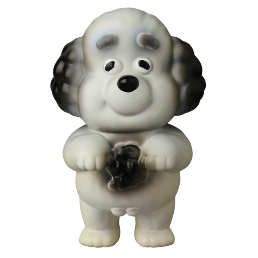 This whimsical dog figurine, named VAG 40 — Norakoinu Dog from Medicom (JP), is part of the Vinyl Artist Gacha collection and features large ears and big eyes. It stands upright on two legs while holding an indistinct object in its paws, showcasing a sleek white and gray color scheme common in Japanese vinyl toys.