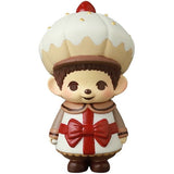 The VAG 45 — Monchhichi Happy Gift Box by Medicom (JP) is a Japanese vinyl toy with a large pastry-shaped hat, brown hair, and a white outfit with red accents—ideal for fans of Vinyl Artist Gacha collectible figures.