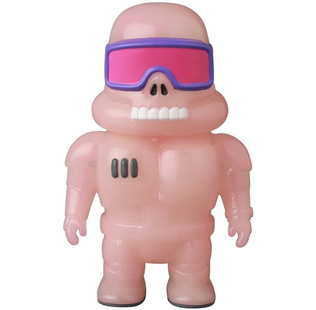 The VAG 45 — Space Controller by Medicom (JP) is a pink humanoid toy figure with a toothy grin, three black chest marks, and bold pink-purple goggles—a whimsical Japanese vinyl collectible for gachapon enthusiasts.
