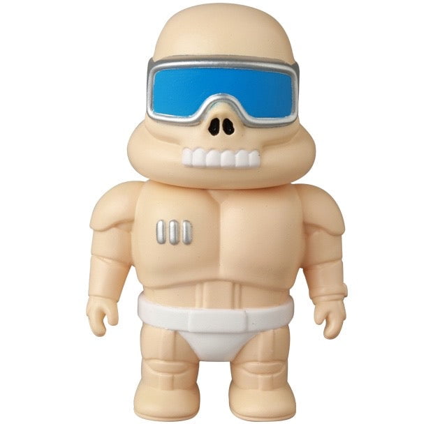 VAG 45 — Space Controller by Medicom (JP): a muscular tan figure with a skull-like face, blue goggles, and white briefs stands upright—an eye-catching Japanese vinyl toy inspired by Vinyl Artist Gacha gachapon figures.