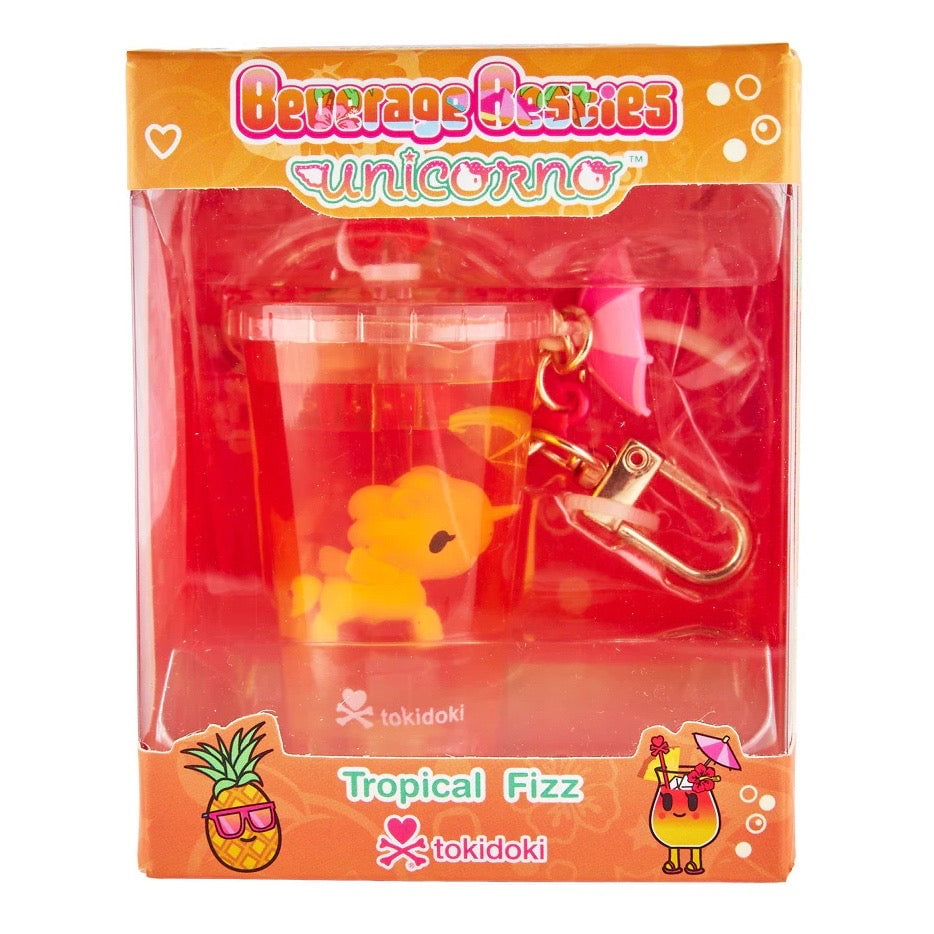 The tokidoki Tokidoki Beverage Besties Unicorno - Tropical Fizz (Special Edition) keychain features a yellow unicorn in a drink cup with a pink straw, accented by vibrant colors and playful fruity details.