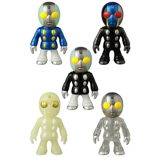 Five VAG 46 — Tane Man vinyl figures by Medicom, each with robot-like forms, round yellow eyes, and unique color patterns, are displayed against a white background—ideal for Japanese vinyl toy collectors.