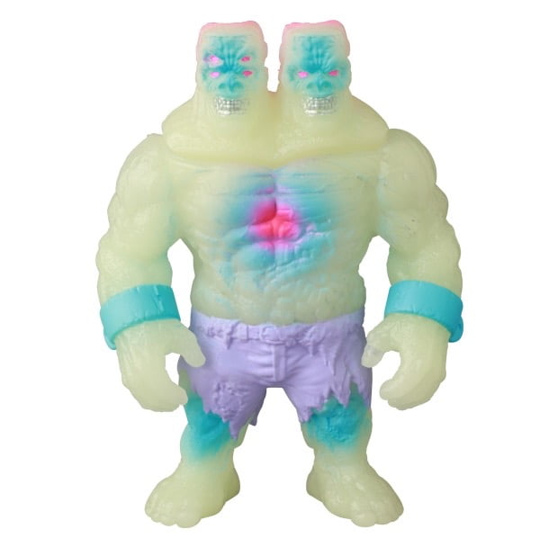 The VAG 46 — Giant Gorilla Franken Mini by Medicom is a two-headed, muscular action figure with glowing pale skin, blue wristbands, purple shorts, and colorful chest spots—a must-have collectible for Vinyl Artist Gacha fans.