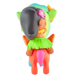 The tokidoki Hawaiian Ohana - Kailani & Anuenue (Special Edition) collectible features a girl with dark hair, green skirt, and flower in her hair sitting on an orange and pink unicorn-like creature, viewed from the back.