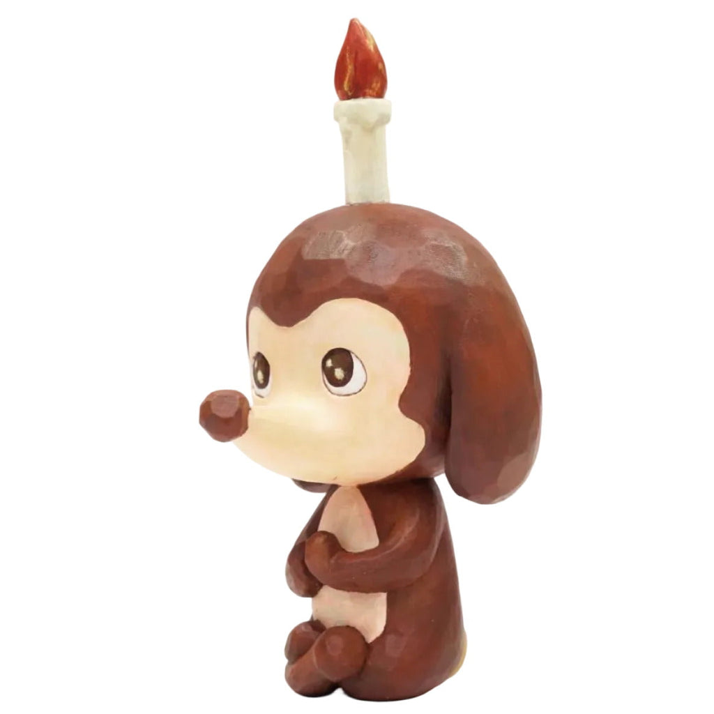 Keep Balance by How2Work (HK) features a brown cartoon-style meditation pup with a candle on its head, sitting upright and holding its knees—perfect for adding serenity and balance to your decor.