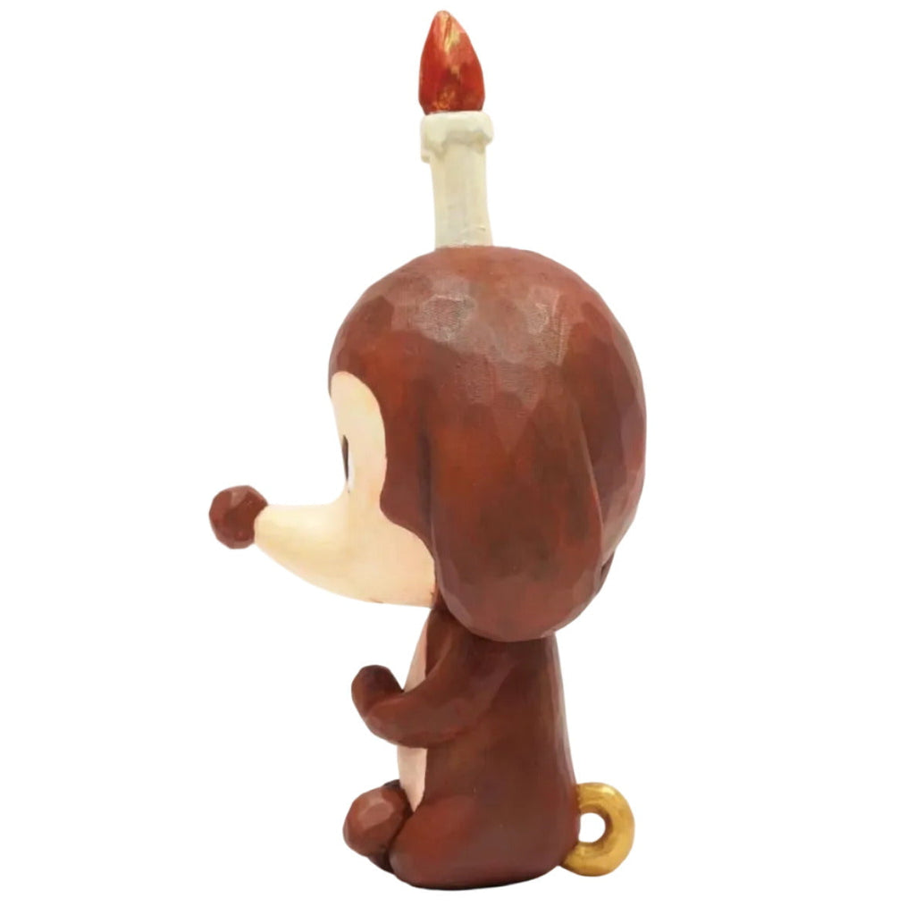 Keep Balance by How2Work (HK) is a small brown cartoon animal figurine with a candle on its head and a yellow ring on its tail—ideal as a meditation pup or unique decor piece for relaxation and balance.