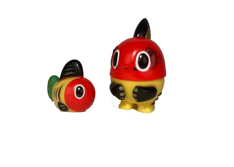 The Kibunado Set-Original by Rotofugi features two quirky toy fish with red heads, black fins, and yellow bodies on a white background. The larger stands upright, the smaller lies on its side—a fun decor accent or cute gift.