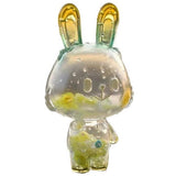 Lemon Soda Robin by A Good Company (HK) is a translucent, rabbit-shaped figurine with yellow and green accents, round eyes, upright ears, and a small smile—a charming ornament to brighten your home decor.