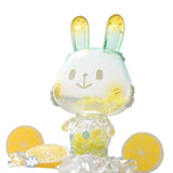 The Lemon Soda Robin by A Good Company (HK) is a translucent figurine with yellow-tipped ears and yellow bead filling, surrounded by lemon slices and ice cubes—a delightful decor piece for any shelf.