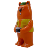 Mamechan - #1 by Paradise Toy (TW) is a plastic bear figurine with a green hat, yellow vest, holding a camera as a tourist collectible, and sporting a surprised expression.