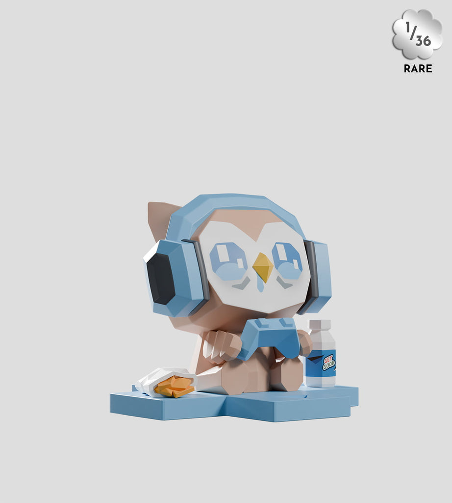 The Kaleidos Creative Mega-Mini Arcade Blind Box features a polygonal owl with blue headphones and glasses, holding a game controller beside snacks and a drink; “1/36 RARE” in the corner highlights its rarity for collectible gamer fans.