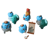Five small blue Rotofugi Bugcat Capoo figurines are posed with a cauldron, books, scroll, magnifying glass, and green accents—perfect as National Palace Museum Adventure-Bugcat Capoo Figurine blind boxes.