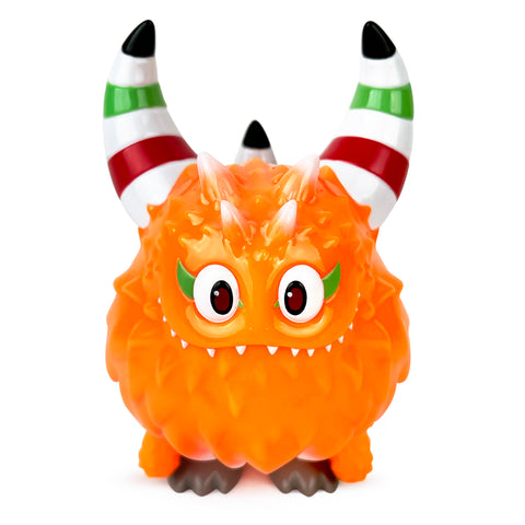 Rangeas Rex Jr. — Lollipop Orange by The Little Hut (HK) features large eyes, striped horns, spiky fur, and stands on gray feet.