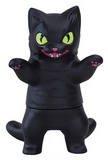 The Negora Color Palette by Konatsuya (JP) is a black kitty kaiju figurine with yellow-green eyes, pink nose, open mouth, and raised arms revealing pink paw pads—an adorable collectible toy for fans.