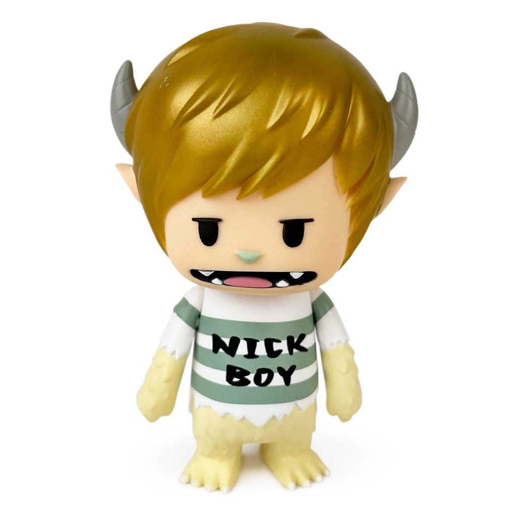 A small cartoon figure with blonde hair, horns, and fangs wearing a 