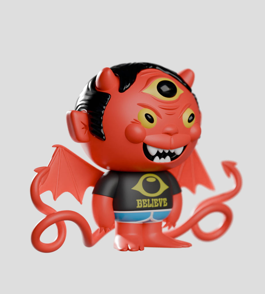 A red, three-eyed devil figurine with horns, wings, a tail, and a 