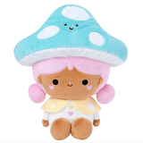 The Skyla Boo - Momiji Magical Meadow Large Plush by Momiji features light brown skin, pink pigtails, heart-shaped cheeks, a blue mushroom hat with a smiley face, a yellow collar, and makes delightful room decor.