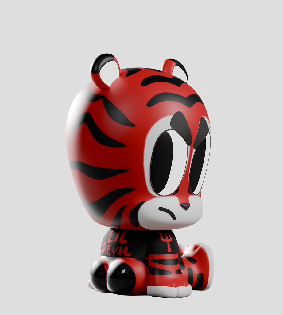 A bold red-and-black tiger figurine with exaggerated eyes and 