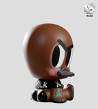A rare (1/36) vinyl figurine of a brown duck with exaggerated features in a black 