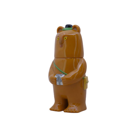 The Kurichan- Milktea figurine by Rotofugi features a brown bear in a green ranger hat holding binoculars, standing upright against a white background—a must-have for any collectible enthusiast.