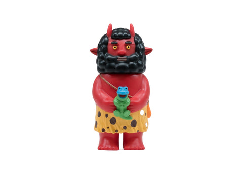 Genchan by Rotofugi is a red cartoon devil caveman with black hair, horns, and a yellow polka-dot skirt, holding a green and blue toy—an eye-catching collectible perfect for vinyl toy enthusiasts.
