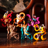 A group of Partner Toys' HitenNeko Flying Cat - Blind Box figurines sitting on top of a table.