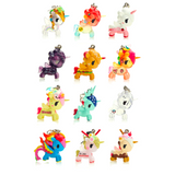 A group of colorful tokidoki Unicorno Frenzies Series 3 - Blind Box unicorn charms on a white background.
