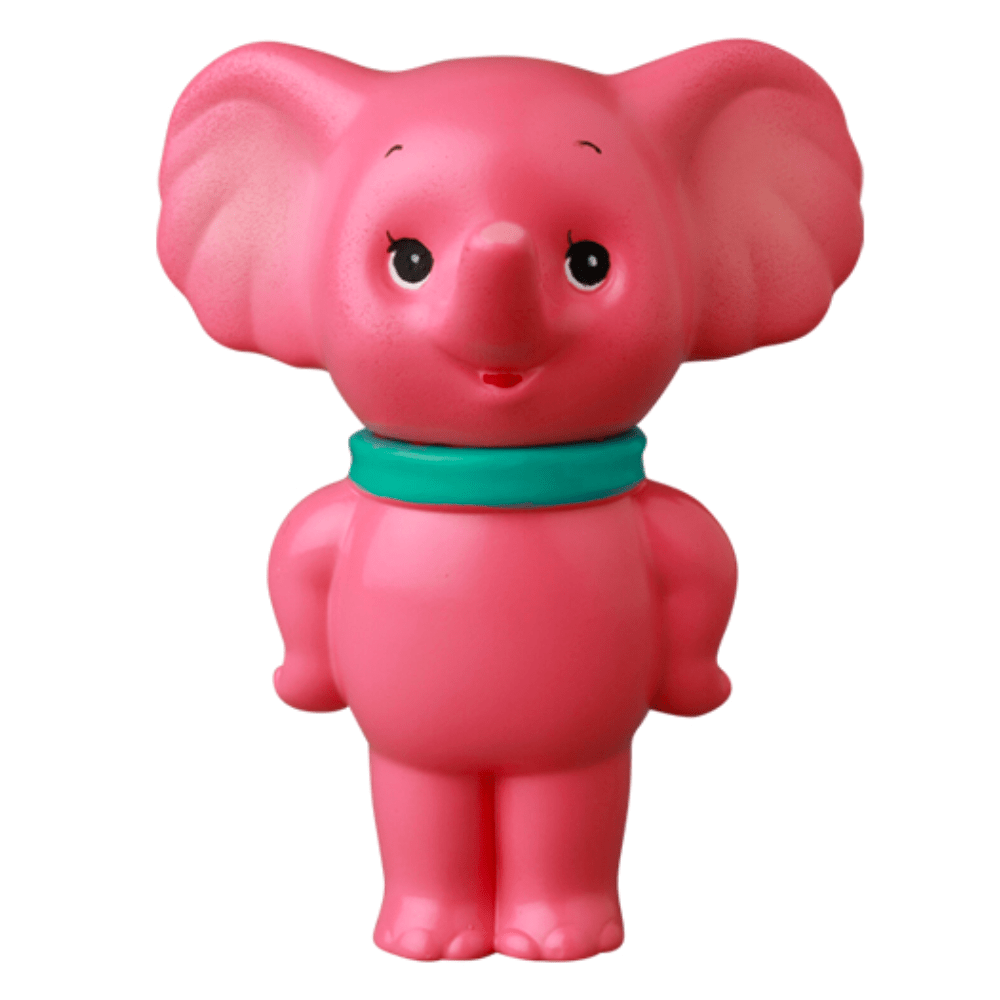 The VAG 43 — ZOU by Medicom (JP) is a pink cartoon elephant figurine with a teal collar, large ears, and a smile, standing upright against a white background, inspired by Japanese vinyl toy styles like those in gachapon figures.