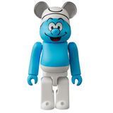 A charming blue and white toy figure with a happy face, wearing a white hat with round ears, is part of Medicom's Be@rbrick Series 49 Blind Box, ideal for fans of surprise collectibles.