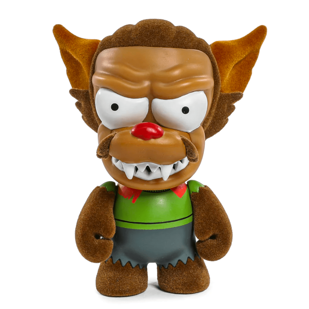 This collectible figure, from Kidrobot's Simpsons Treehouse of Horrors Series 2 Blind Box, is a vinyl figurine of a cartoon werewolf with large ears, sharp teeth, and a red nose in a green shirt and blue pants. It's ideal for fans who enjoy the thrill of unboxing.