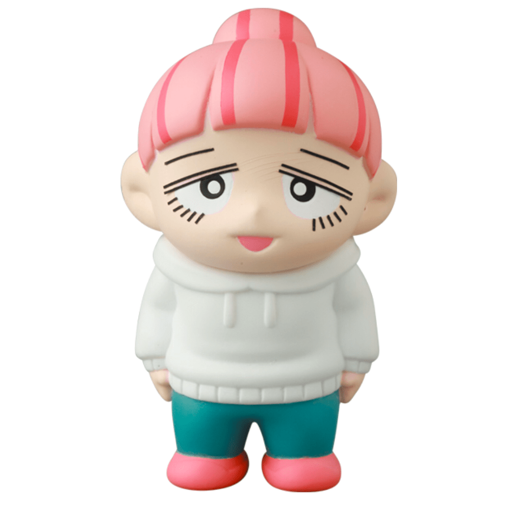 A Vag 35 - Inu No Kagayaki toy with pink hair and a white sweater sits on the work desk.