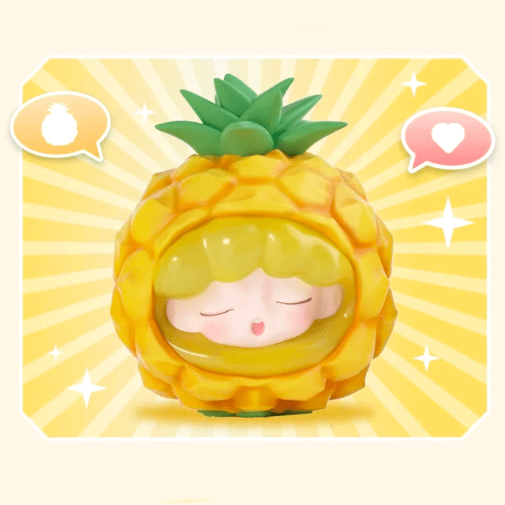 The YUMO — Fruit Market Blind Box by Jotoys features an adorable pineapple-themed cartoon character with closed eyes and yellow ray accents. Accompanied by a speech bubble with a pineapple icon and another with a heart, it’s perfect for any whimsical design or delightful collection.