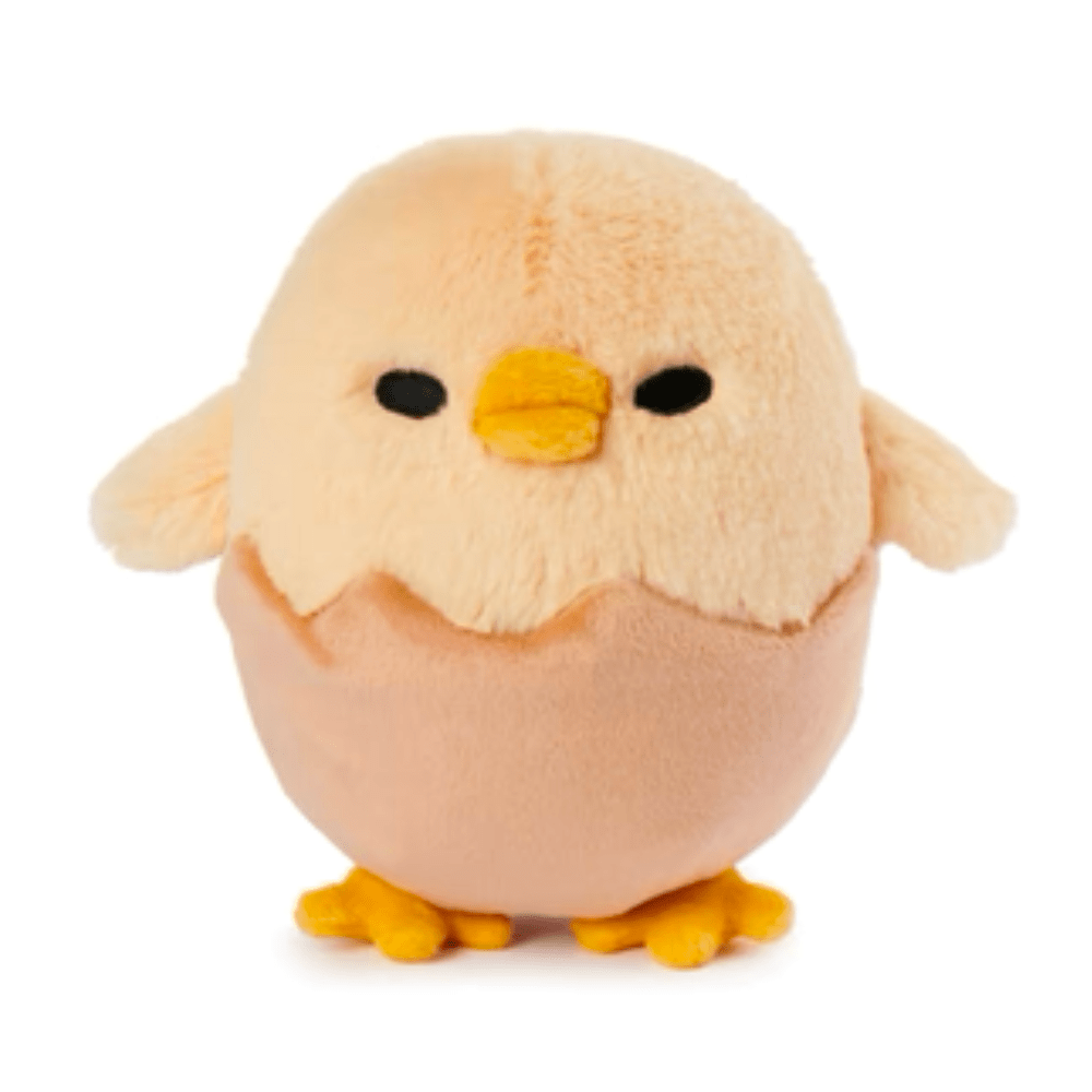 The Gund Gudetama Shakipiyo Egg Plush by Gund (US) is a small, round chick on a hatching adventure, featuring a cream-colored top, brown bottom, yellow beak and feet, and tiny black eyes.