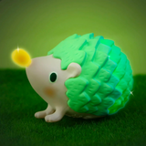 Against a green backdrop, a charming hedgehog toy from the 