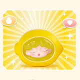 The YUMO — Fruit Market Blind Box by Jotoys features a charming fruit figurine with a lemon helmet and closed eyes against a starburst background. Its random charm, enhanced by pineapple and heart speech bubbles, makes it a delightful addition to any collection.