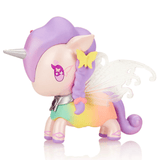 A colorful Tokidoki Butterfly Fairy Limited Edition Figure with purple hair, a star on its cheek, and translucent butterfly wings, posed against a white background.