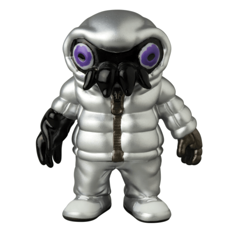 Medicom (JP) VAG 10th Anniversary — Cthuloid: A silver collectible inspired by Japanese vinyl toy design, featuring a puffy suit, oversized black gloves/boots, and a helmet with large purple eyes and a black beak-like mask.