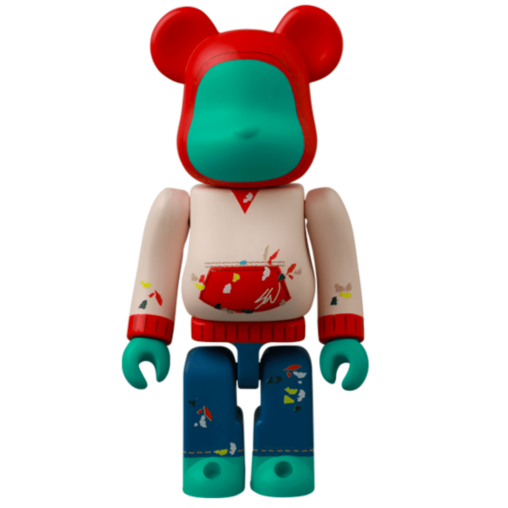 The Be@rbrick Series 49 Blind Box toy figure from Medicom (JP) showcases a red hood, teal face and hands, cream torso with red details, and blue pants with patterns—ideal for collectors' treasure hunts.