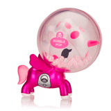 A small, pink, machine-shaped toy with a spherical, transparent top labeled 