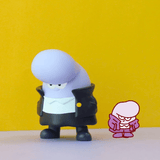 A purple cartoon-style figure with a large head and black jacket stands beside a matching drawn version—resembling haunted house characters—against yellow, from the HIHI Trickster Daily - Blind Box by Partner Toys.