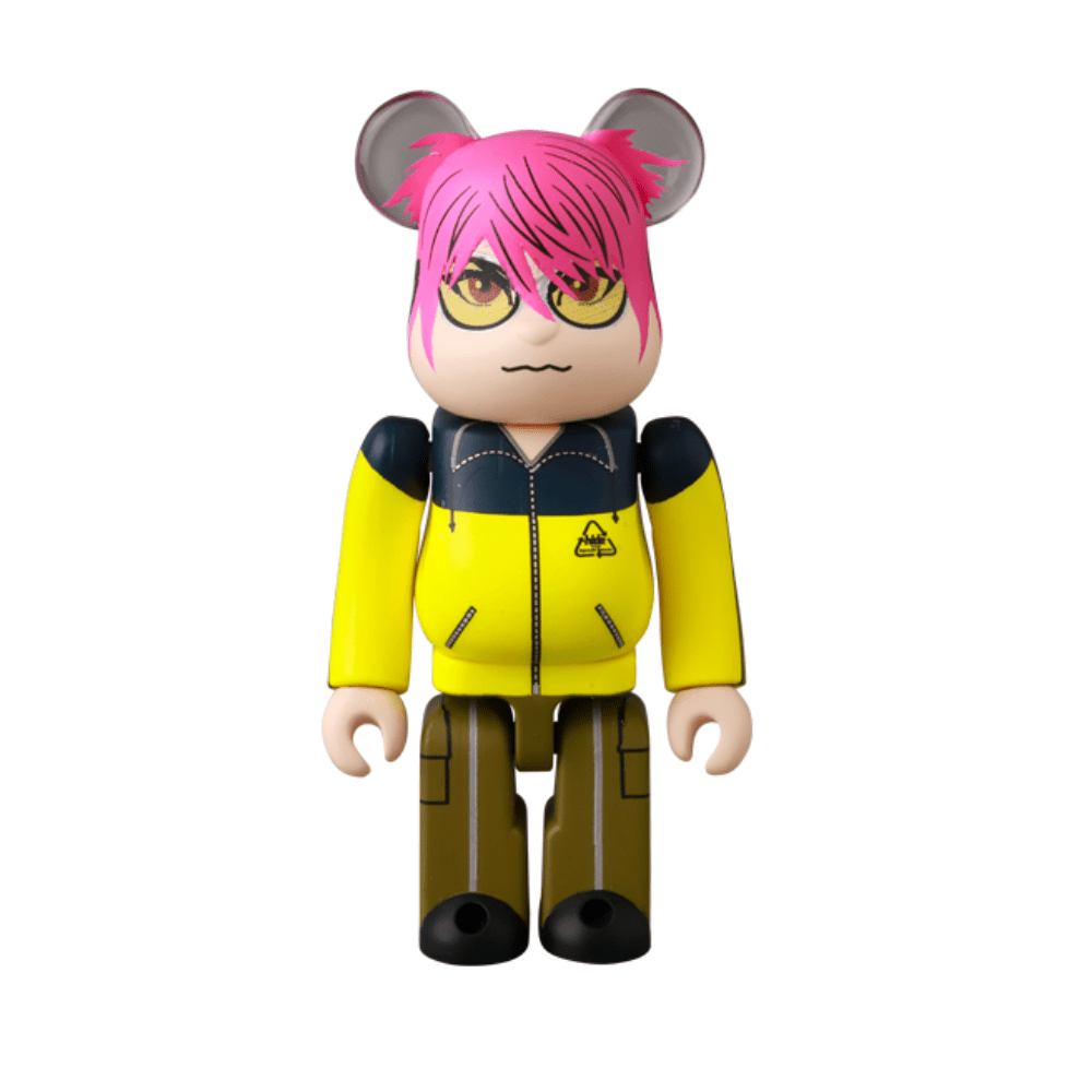 The Be@rbrick Series 50 Blind Box by Medicom (JP) features a toy with pink hair, round glasses, mouse ears, a yellow and black jacket, and brown pants—an ideal addition for collectors.