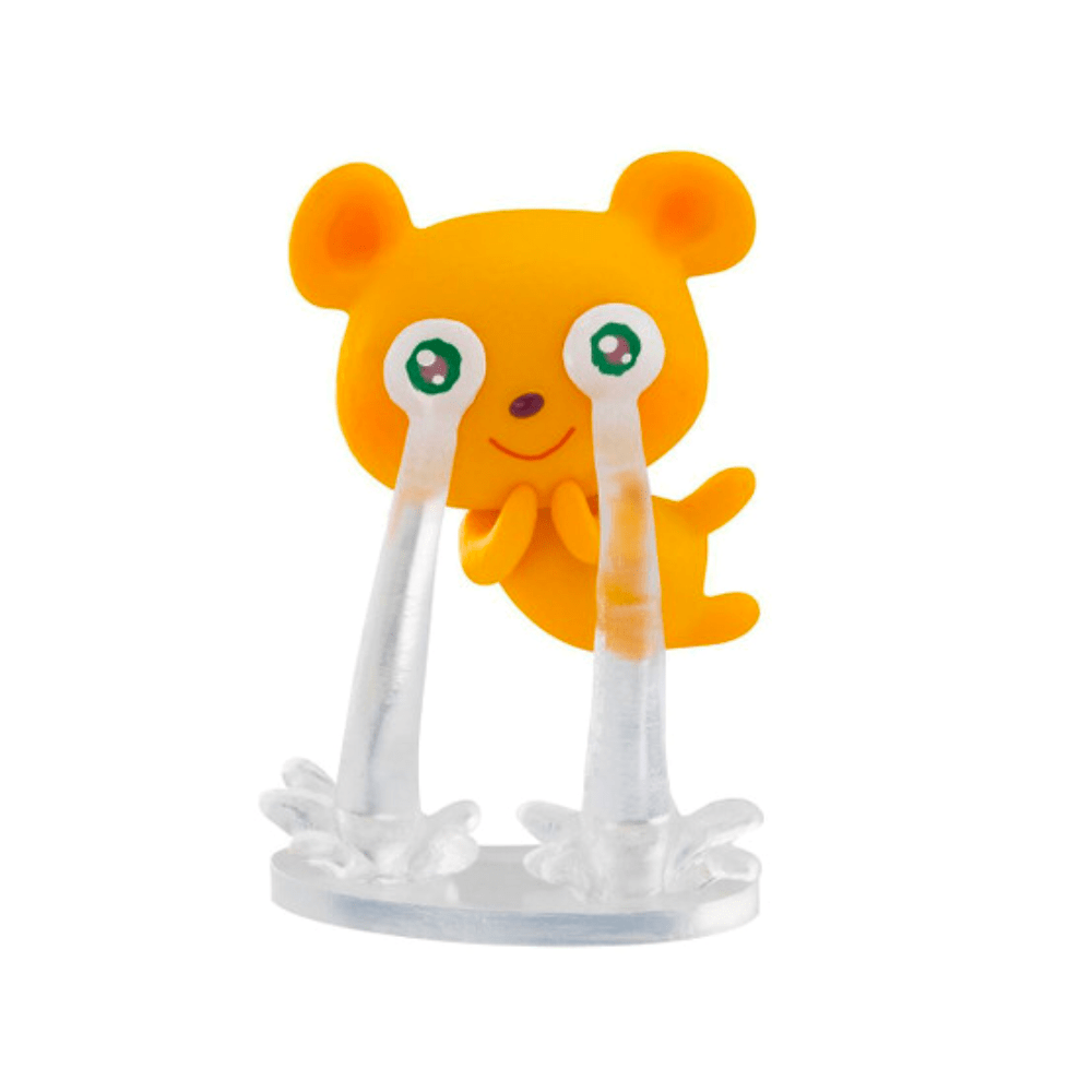 A Chen Wei Ting - Blind Box toy teddy bear stands atop a piece of plastic, evoking childhood dreams.