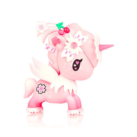A stylized pink Tokidoki Flower Power Unicornos Series 2 - Blind Box figurine from the Tokidoki collection, decorated with floral motifs and cherry accessories against a white background.