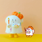 A white cartoon figure with a pumpkin-like orange beret holds a paintbrush and palette beside a small friend on a yellow surface. This playful scene features Partner Toys’ HIHI Trickster Daily - Blind Box, adding ghostly charm to any space.