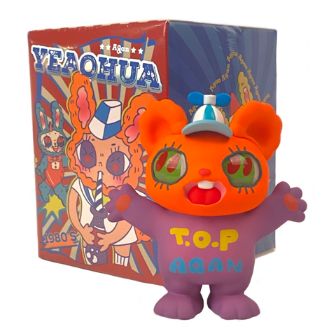 A Yeaohua - American Vintage Blind Box teddy bear sits in front of a box.