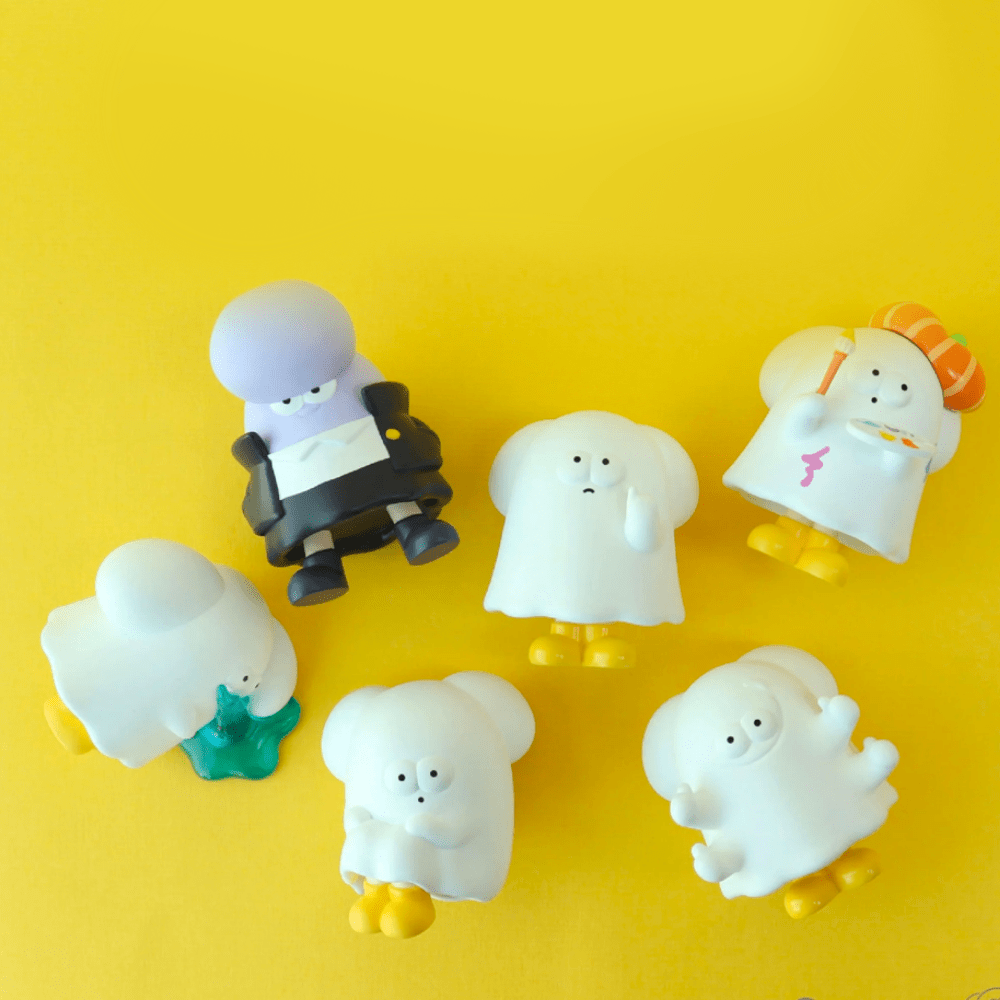 Six cartoonish sheet ghost figurines from the HIHI Trickster Daily - Blind Box by Partner Toys, each with round yellow feet, are arranged playfully on a yellow surface—perfect for any blind box collector.