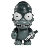 The Simpsons Treehouse of Horrors Series 2 Blind Box by Kidrobot (US) features a gray cartoon figurine with bulging eyes and a wide smile, holding a doll-like white figure in its right hand, akin to highly sought-after collectibles.