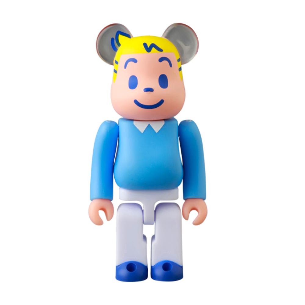 A Medicom (JP) Be@rbrick Series 50 Blind Box figure with blonde hair, a blue shirt, and white pants stands upright against a white background.